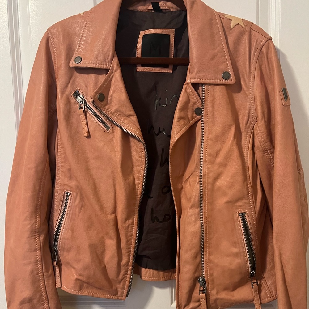 Leather bomber jacket with stars on back